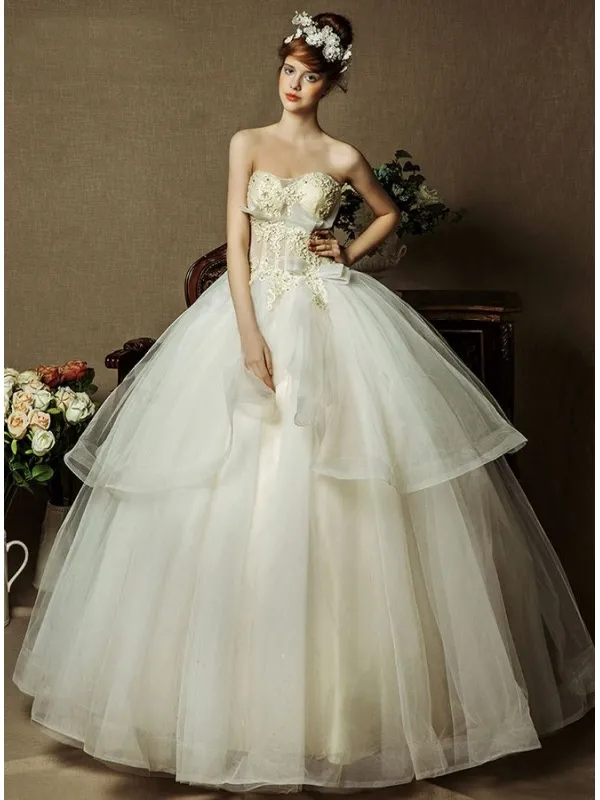 Abito da Sposa Scollato a Cuore con gonna in tulle e corpetto trasparente lavorato