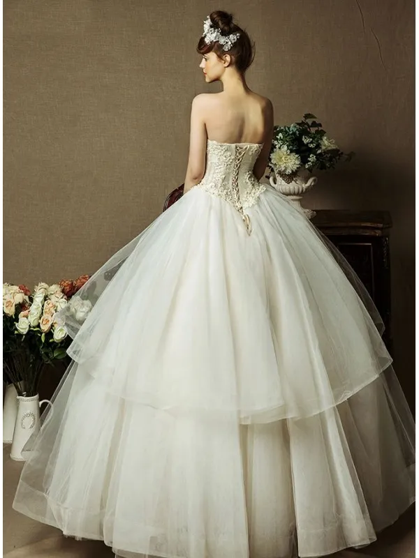 Abito da Sposa Scollato a Cuore con gonna in tulle e corpetto trasparente lavorato