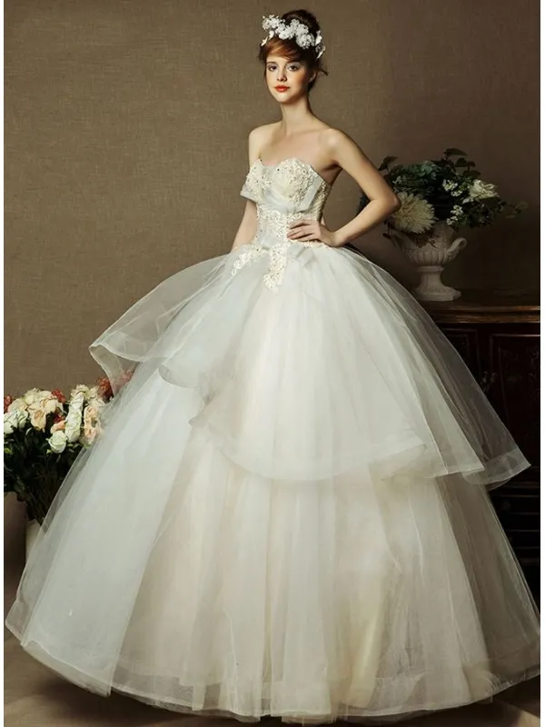 Abito da Sposa Scollato a Cuore con gonna in tulle e corpetto trasparente lavorato