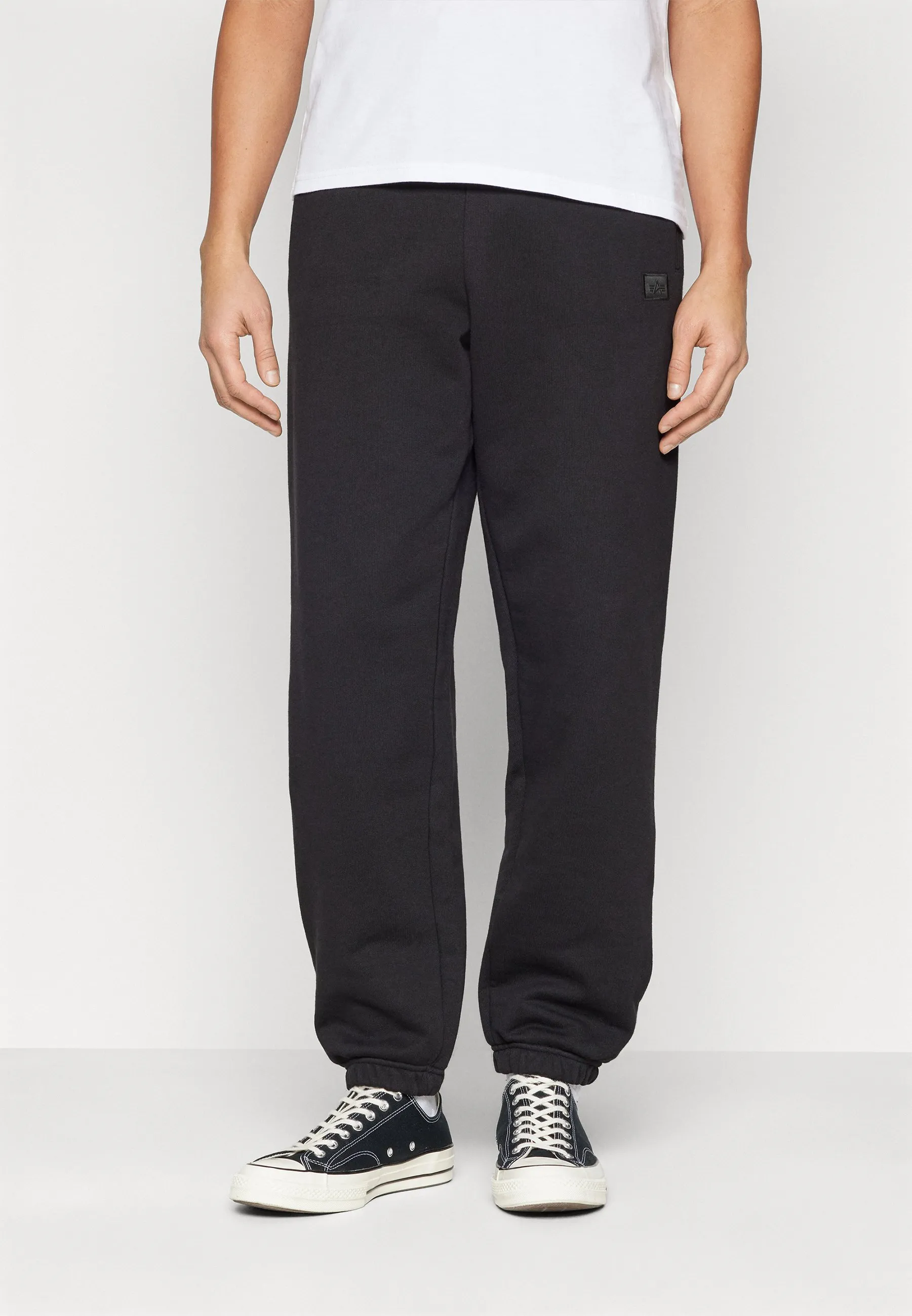 ALPHA ESSENTIALS JOGGER - Pantaloni sportivi