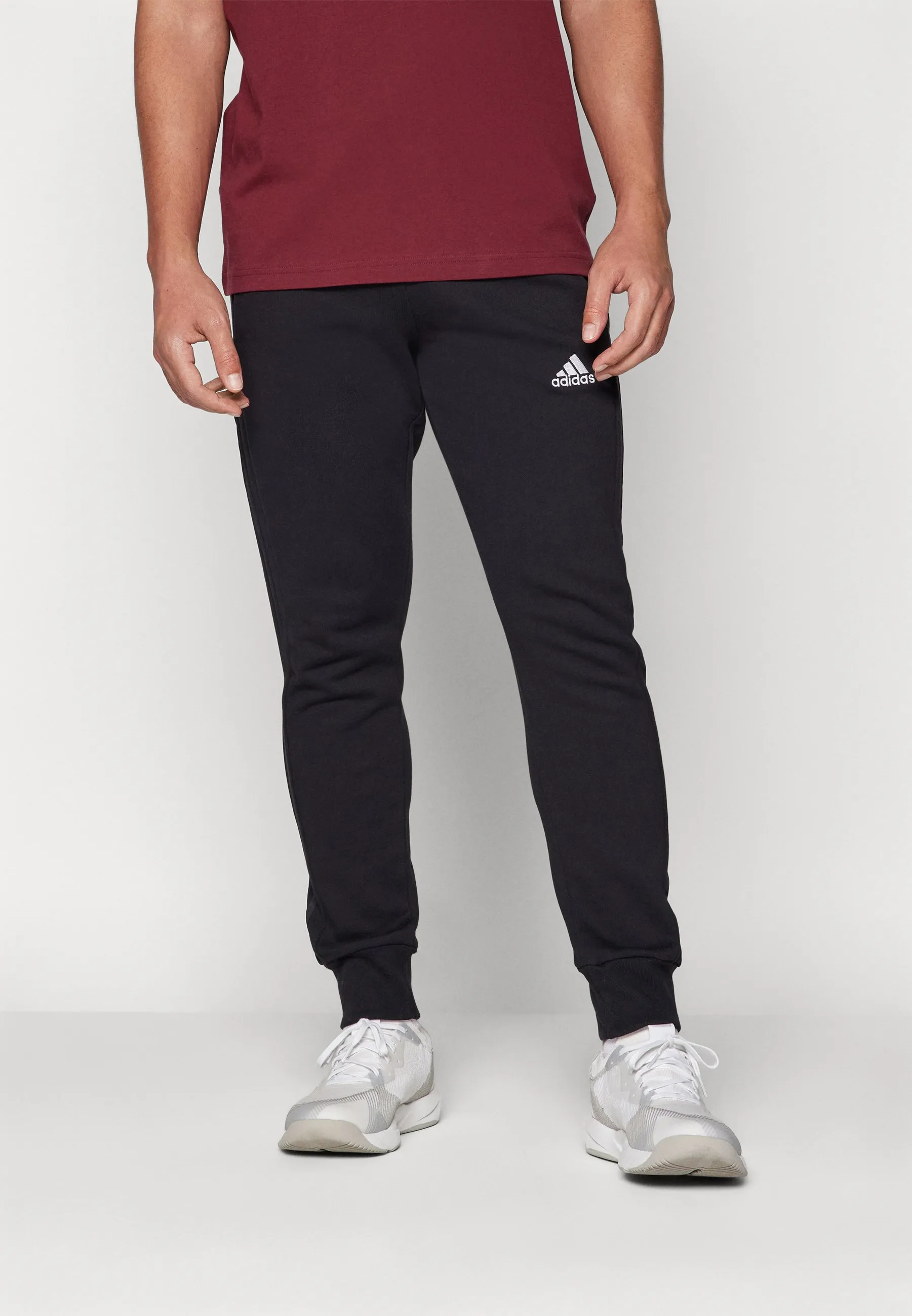 ESSENTIALS FRENCH TERRY TAPERED CUFF 3 STRIPES PANTS - Pantaloni sportivi
