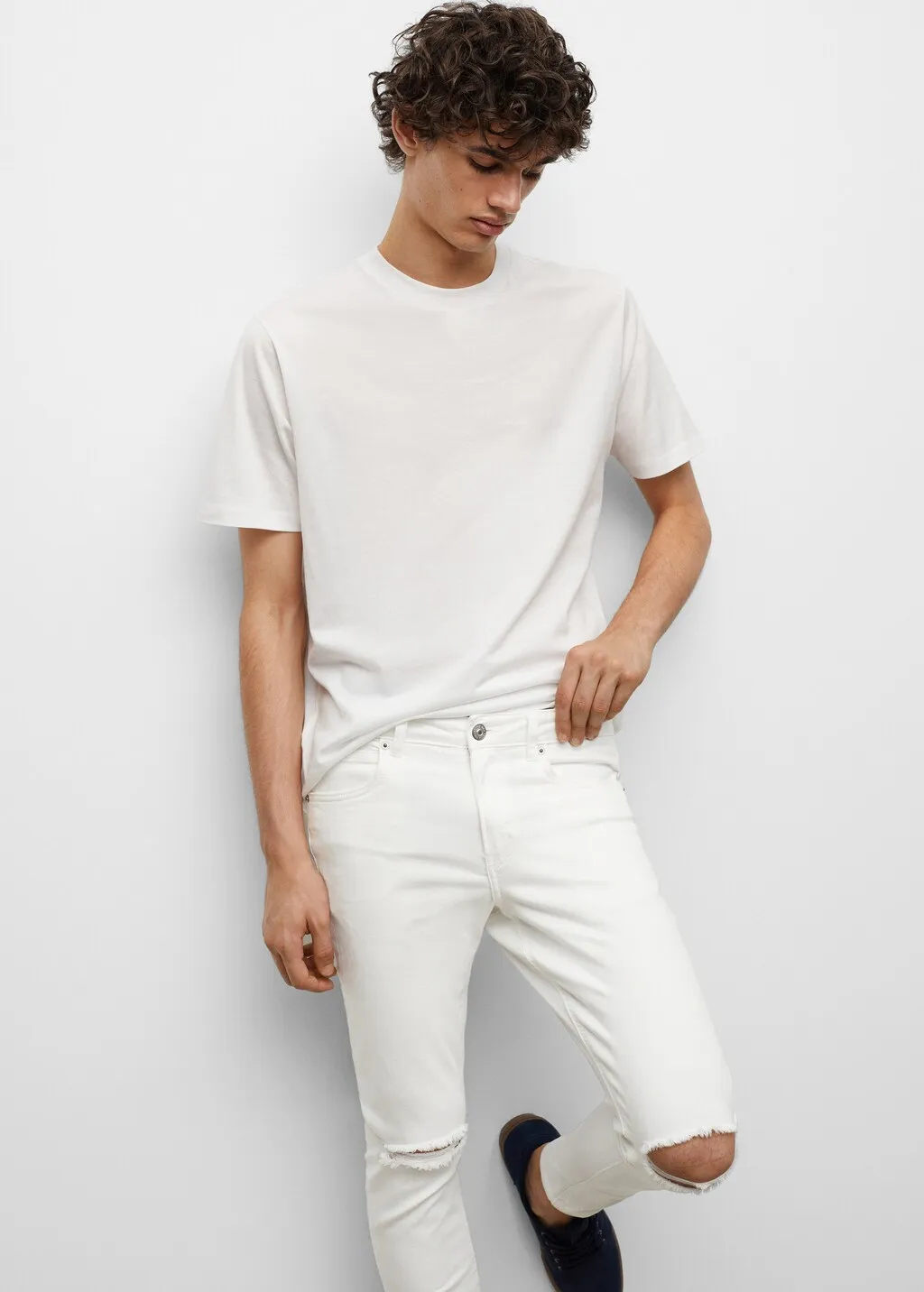 Jeans skinny strappi decorativi