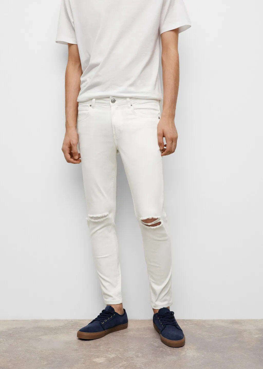 Jeans skinny strappi decorativi