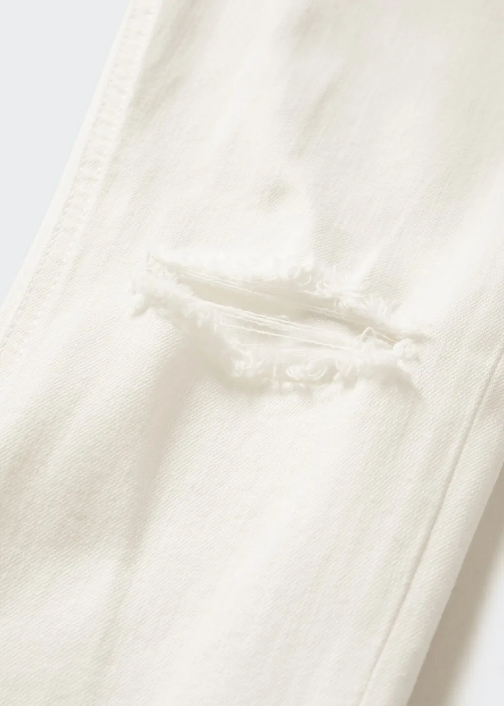 Jeans skinny strappi decorativi