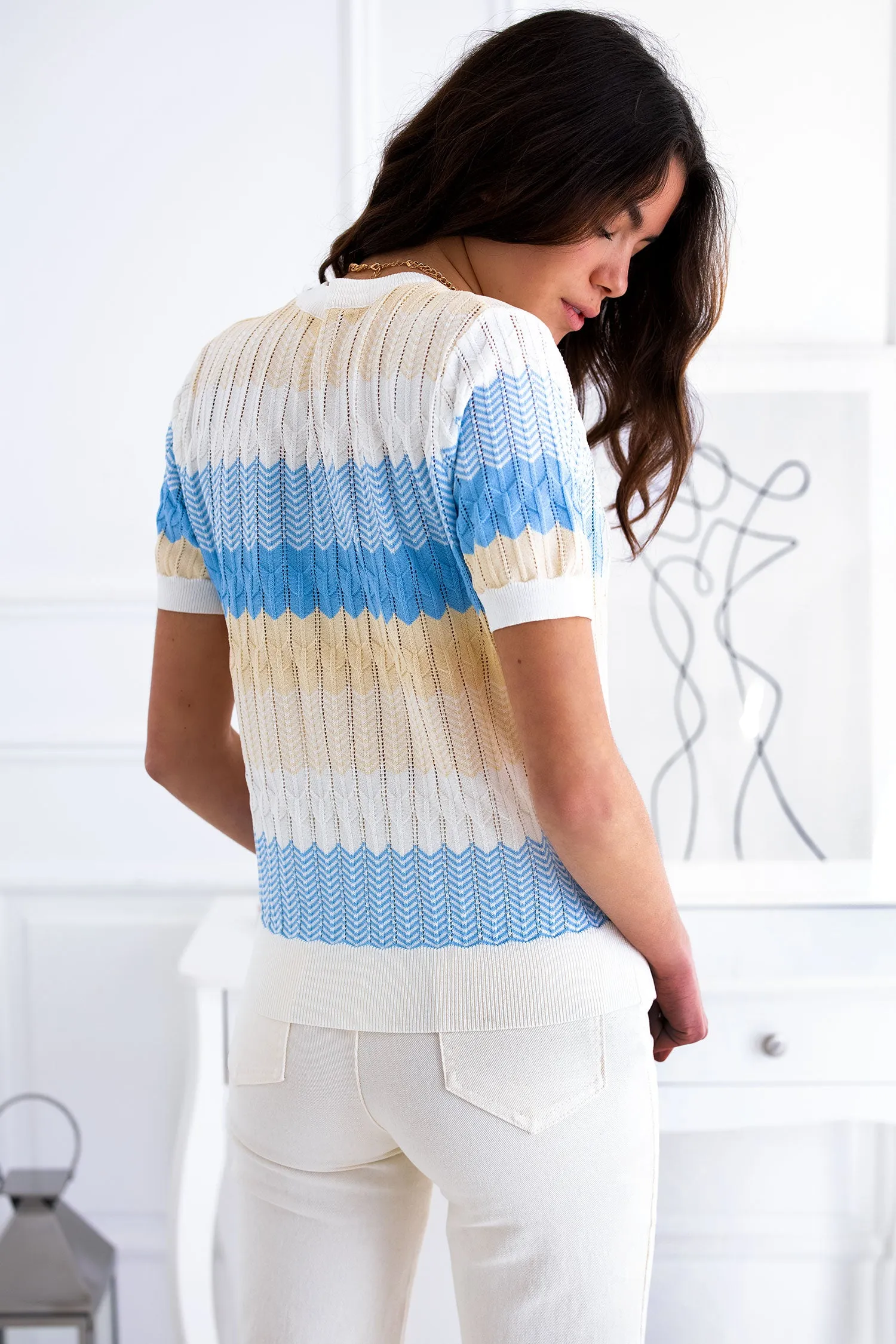 Maglia azzurra mezza maniche a zig zag