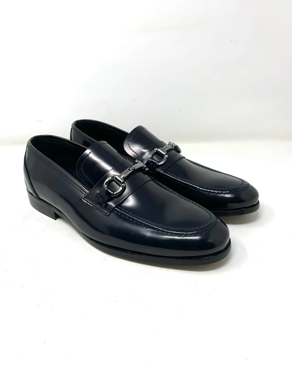 Mocassino pelle con morsetto fondo cuoio