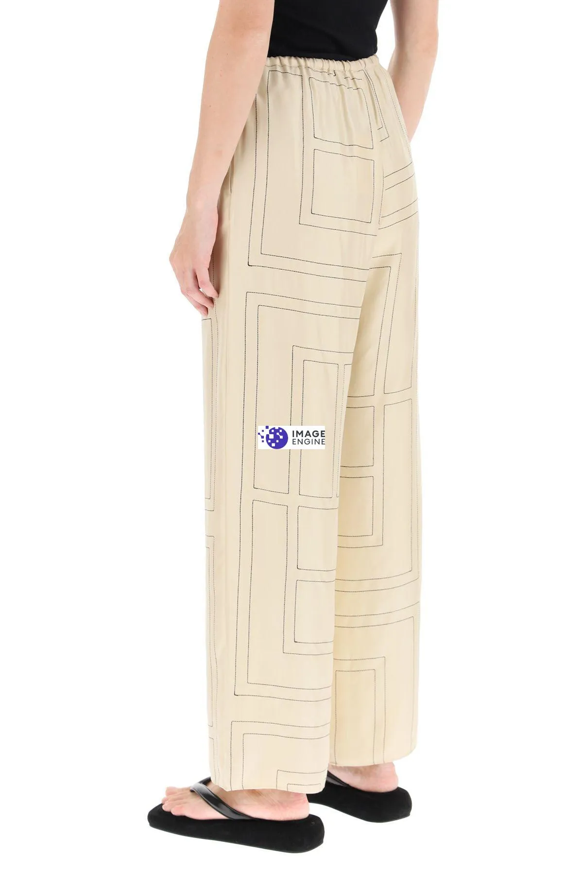 Pantaloni in seta ricamo monogram