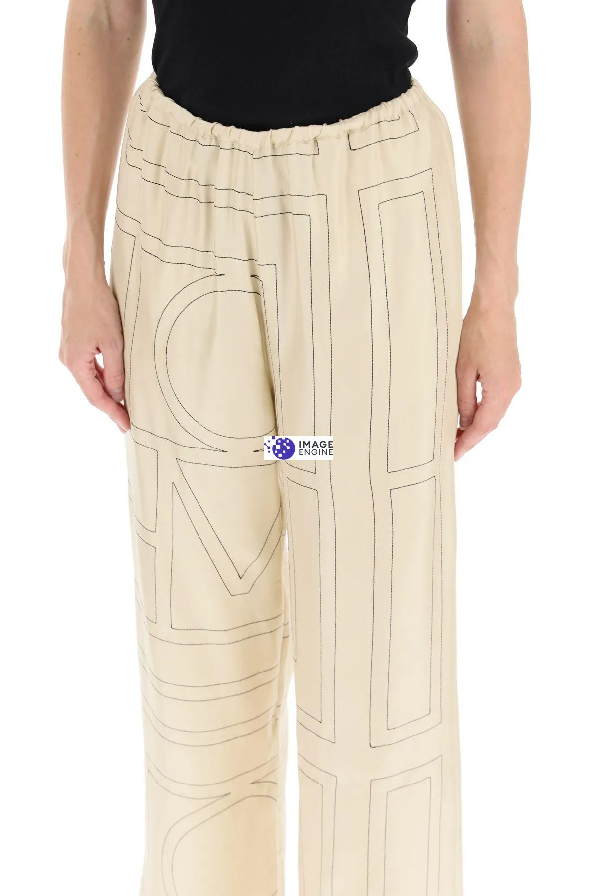 Pantaloni in seta ricamo monogram